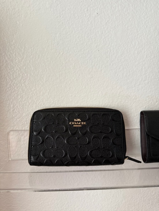Coach Handbags - Coach Black Embossed Signature Zip Wallet with Gold Logo